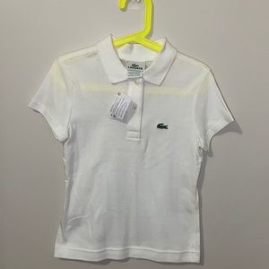 Girls white Lacoste polo shirt.